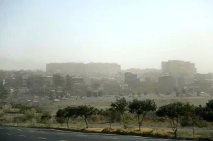 تهران در باران و گردوخاک می رود