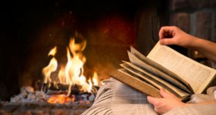bigstock hands of woman reading book by 74597689
